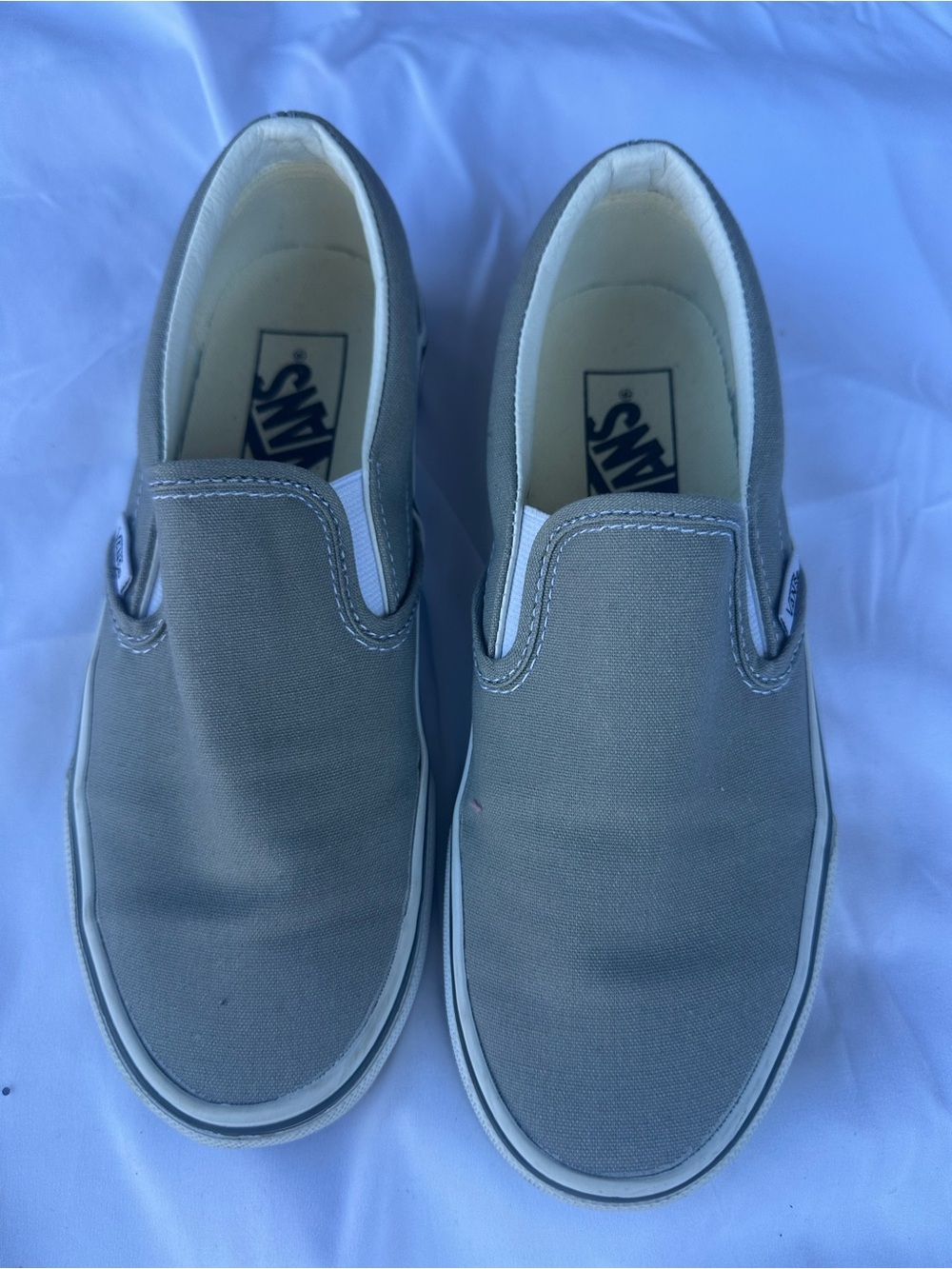 Vans Slip-On Canvas Sneakers in Gray and White